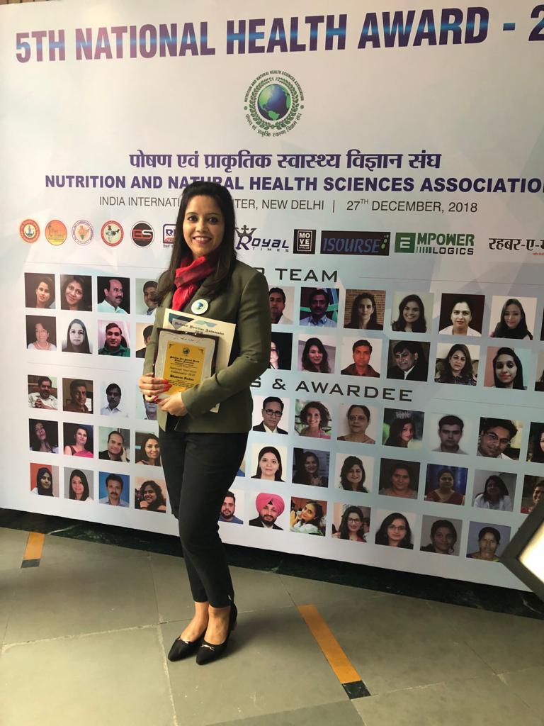 Dietitian Bhawana Sachan receiving award